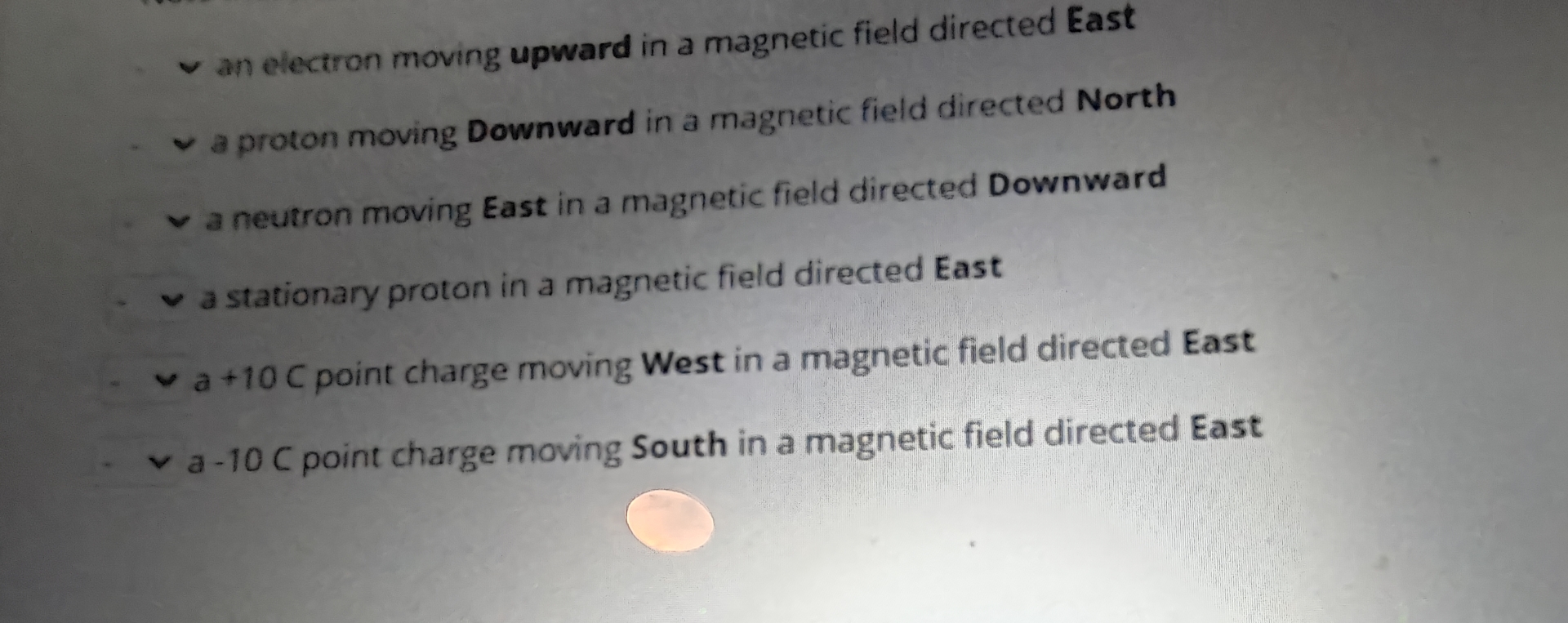 an electron moving upward in a magnetic field