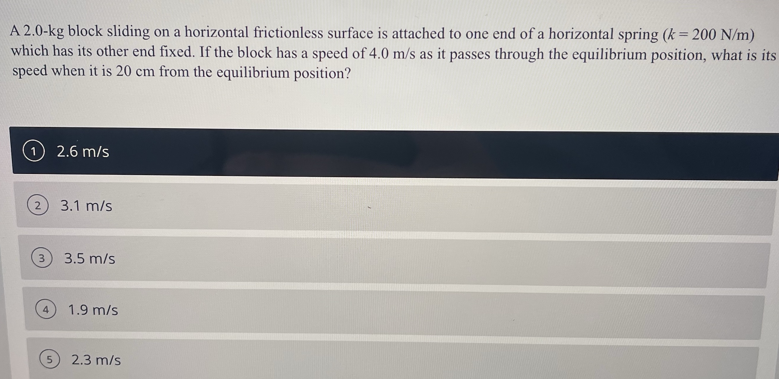 A 2 . 0 - kg block sliding on a horizontal