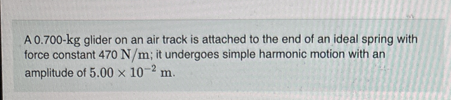 A 0 . 7 0 0 - k g glider on an air track is