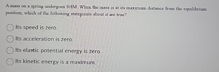A mass on a spring undergoes SHM . When the mass