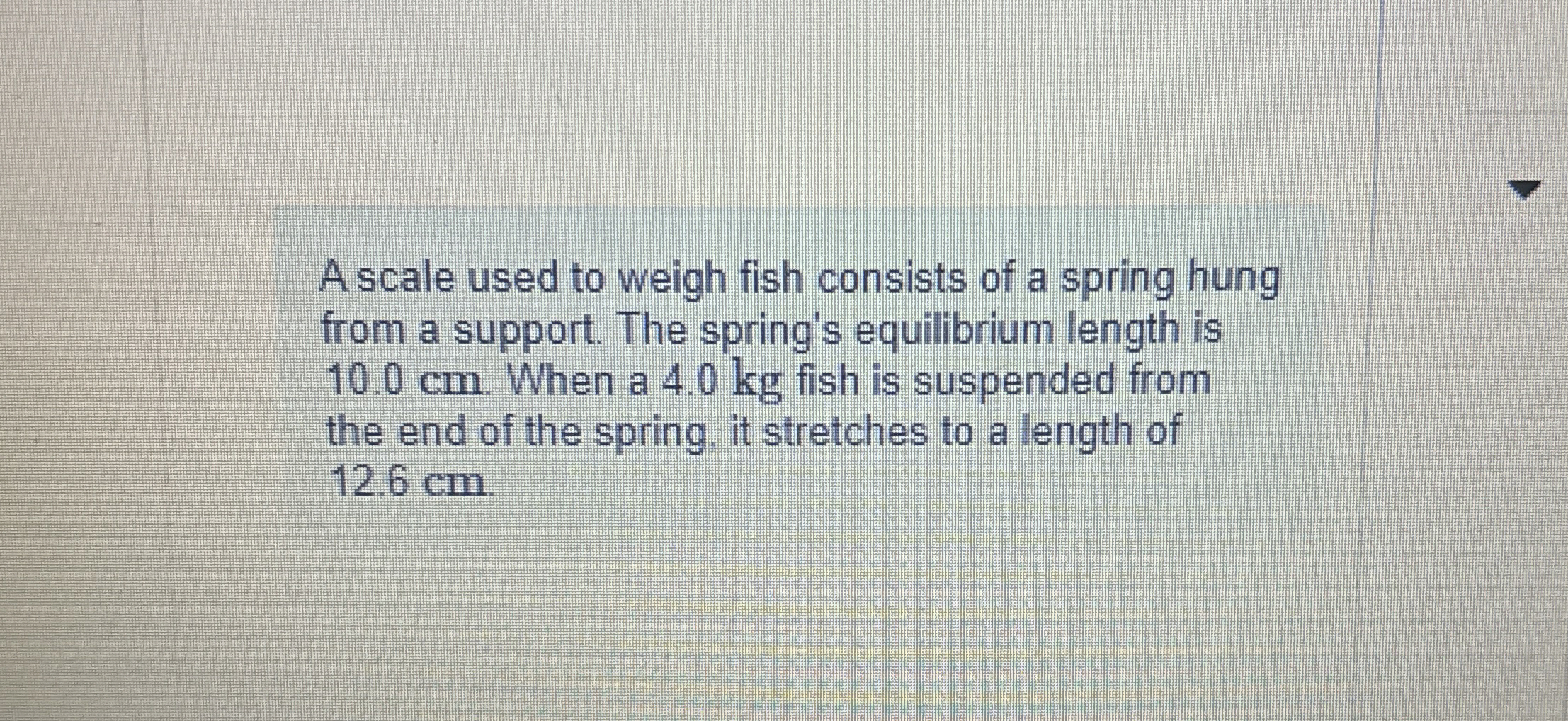 A scale used to weigh fish consists of a spring