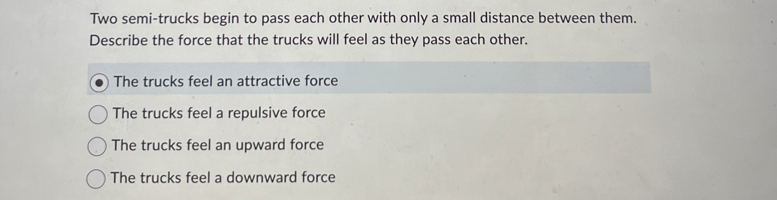 Two semi - trucks begin to pass each other with