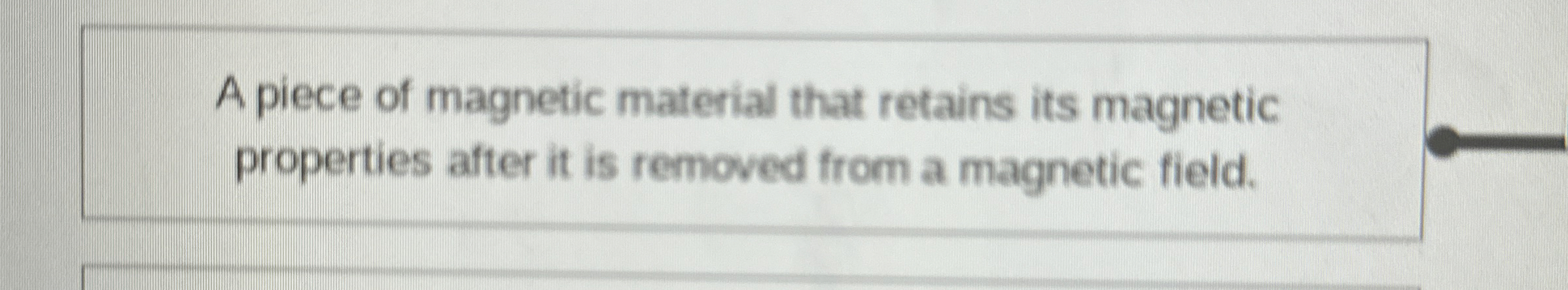 A piece of magnetic material that retains its