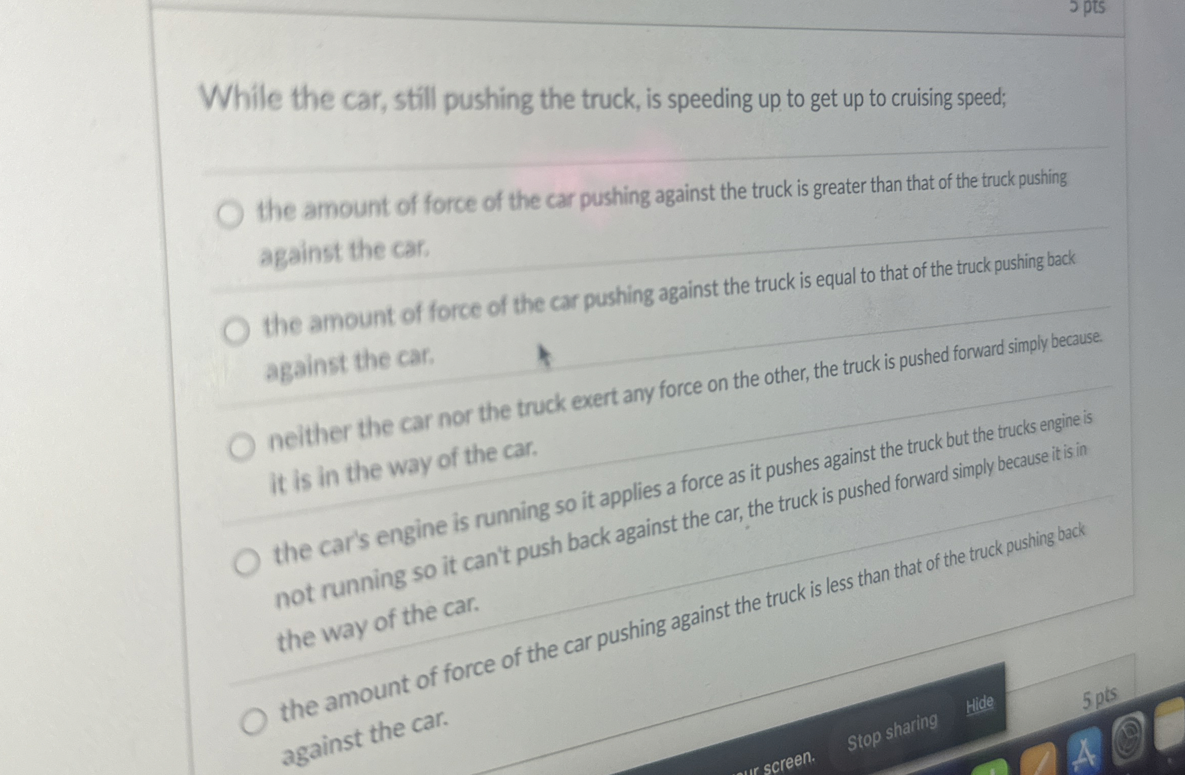 spts While the car, still pushing the truck, is