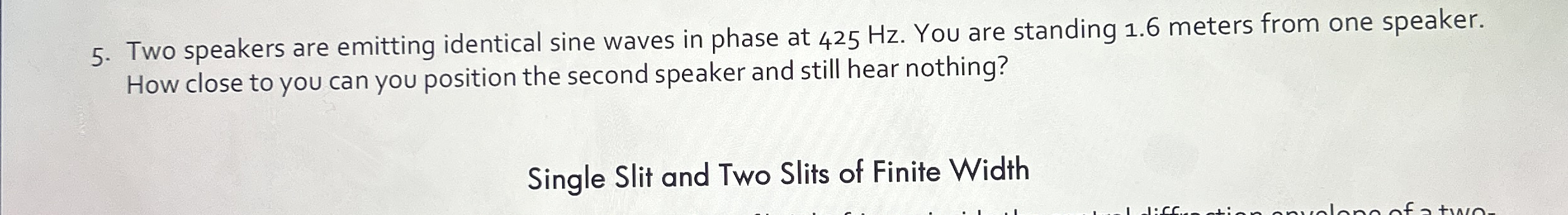 Two speakers are emitting identical sine waves in