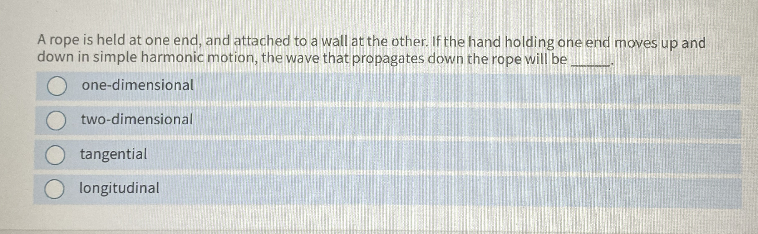 A rope is held at one end, and attached to a wall