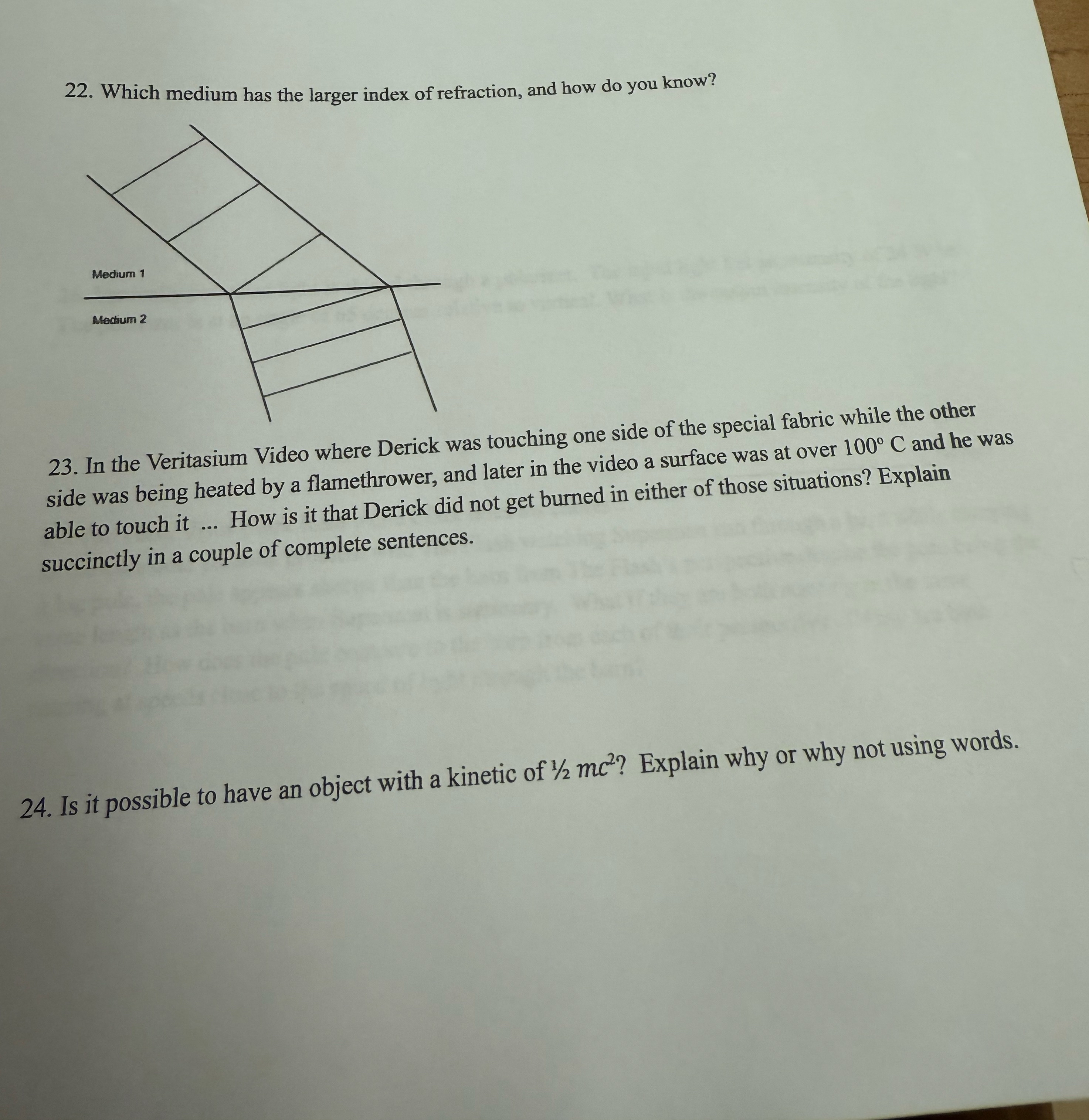 Which medium has the larger index of refraction,