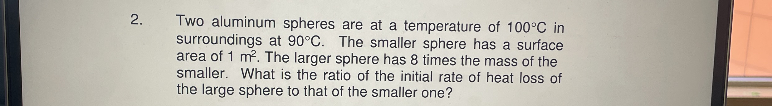 Two aluminum spheres are at a temperature of 1 0