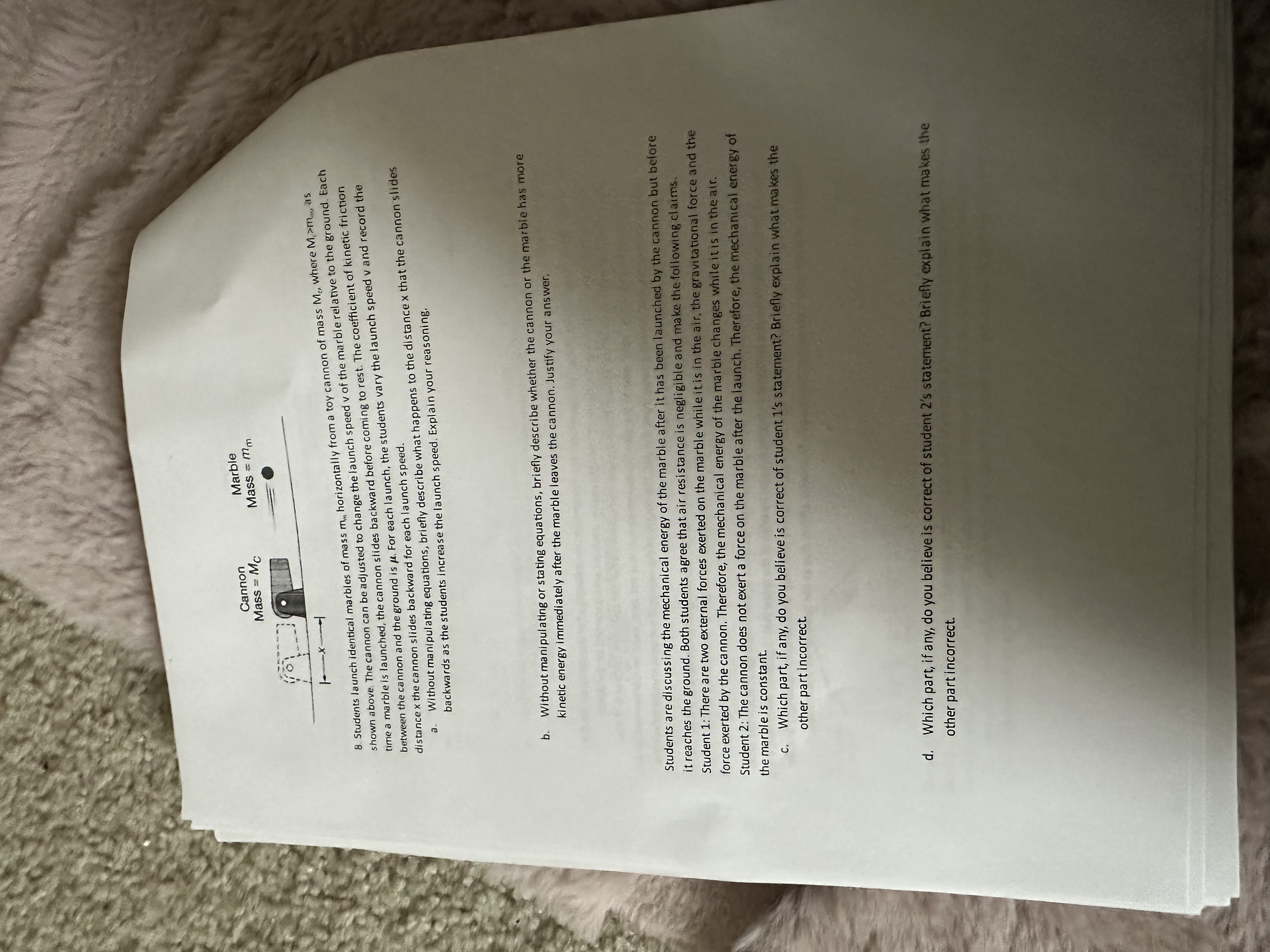 8 . Students launch identical marbles of mass \ (