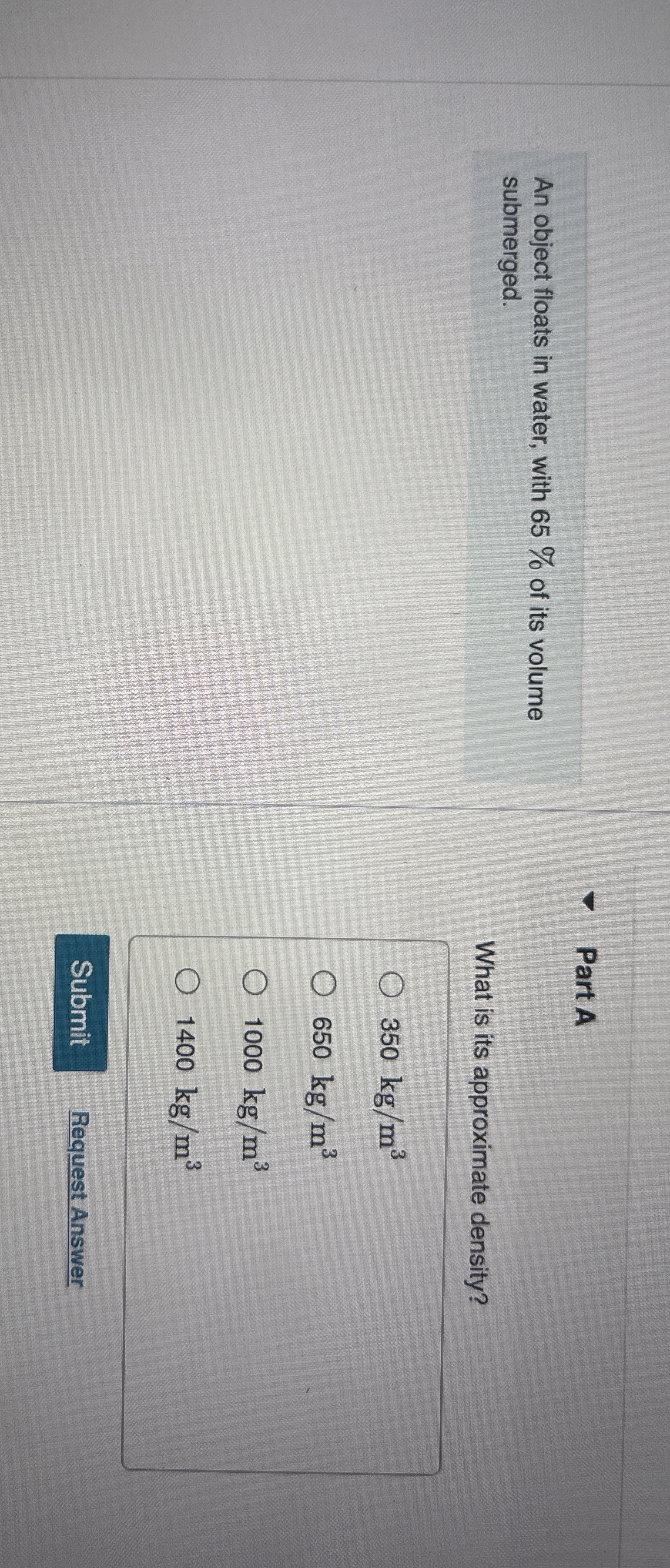 An object floats in water, with 6 5 % of its