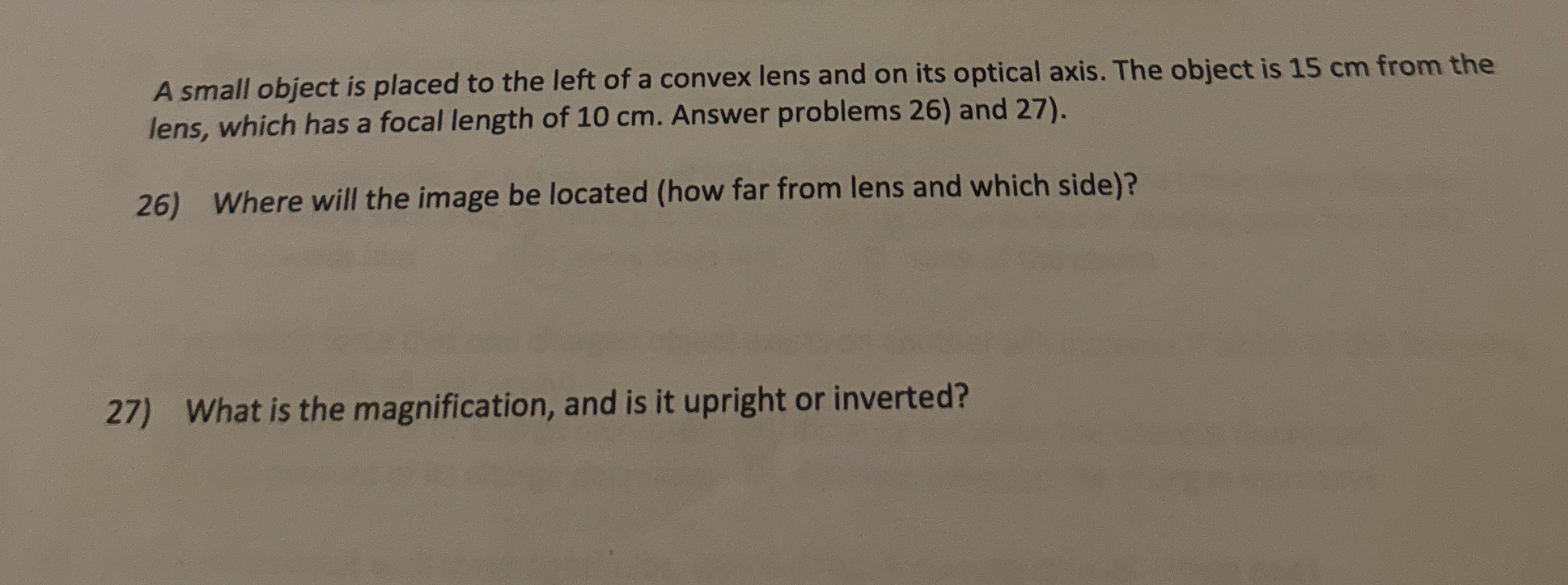 A small object is placed to the left of a convex