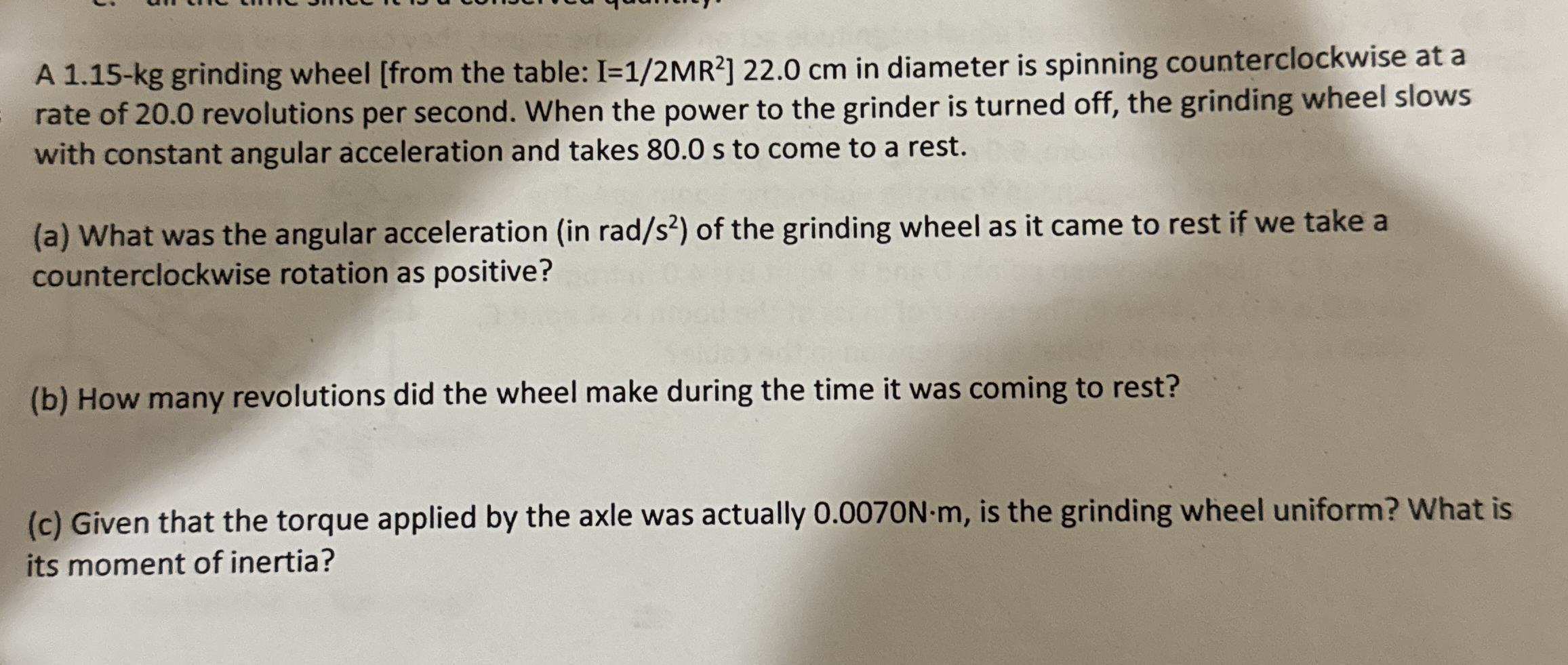A 1 . 1 5 - kg grinding wheel [ from the table: I