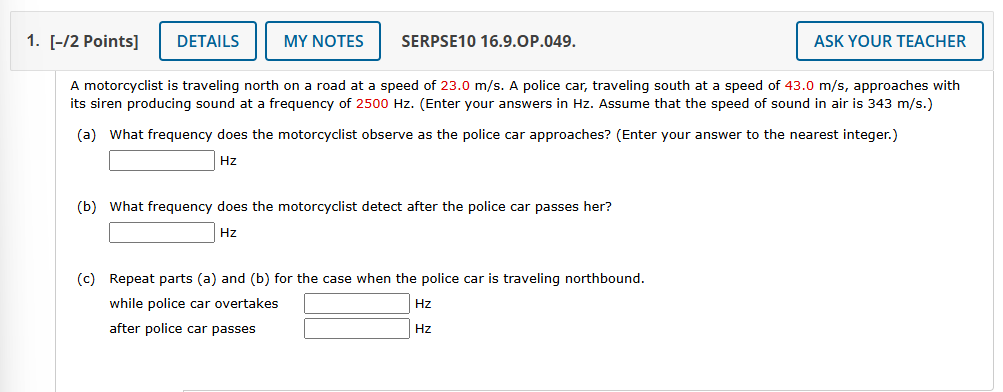 A motorcyclist is traveling north on a road at a