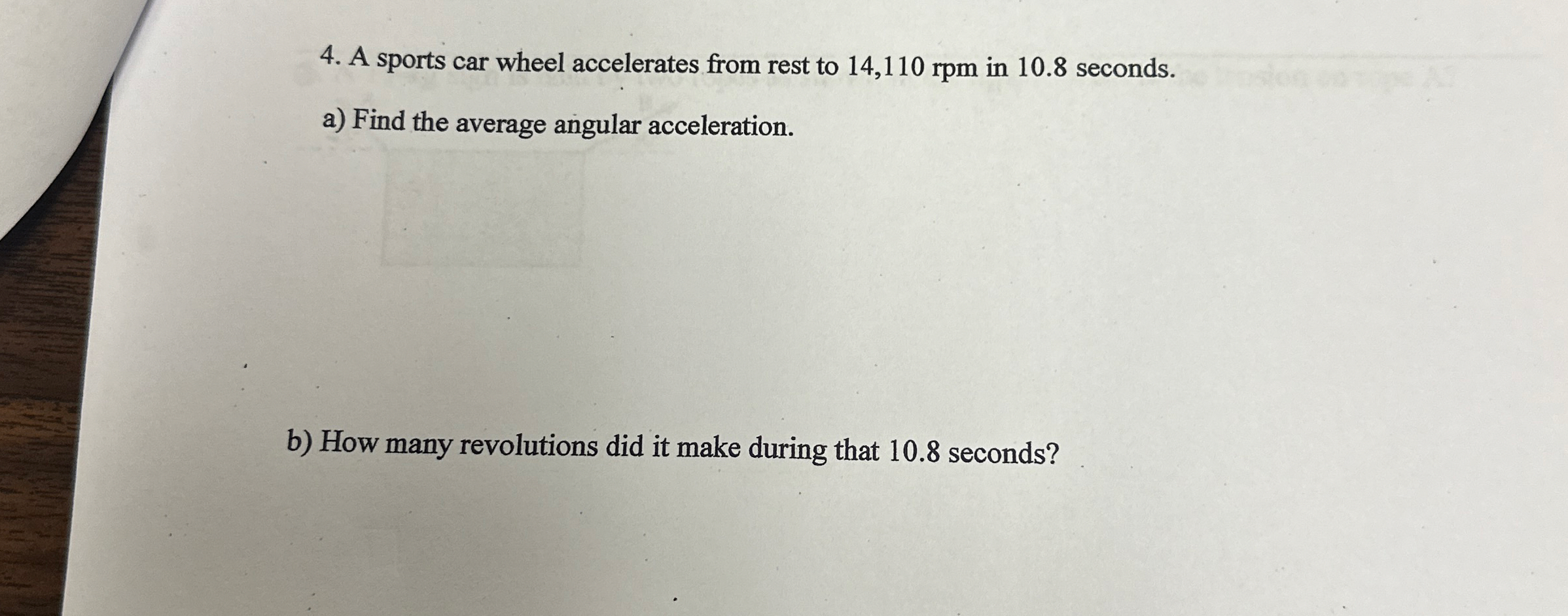 A sports car wheel accelerates from rest to 1 4 ,