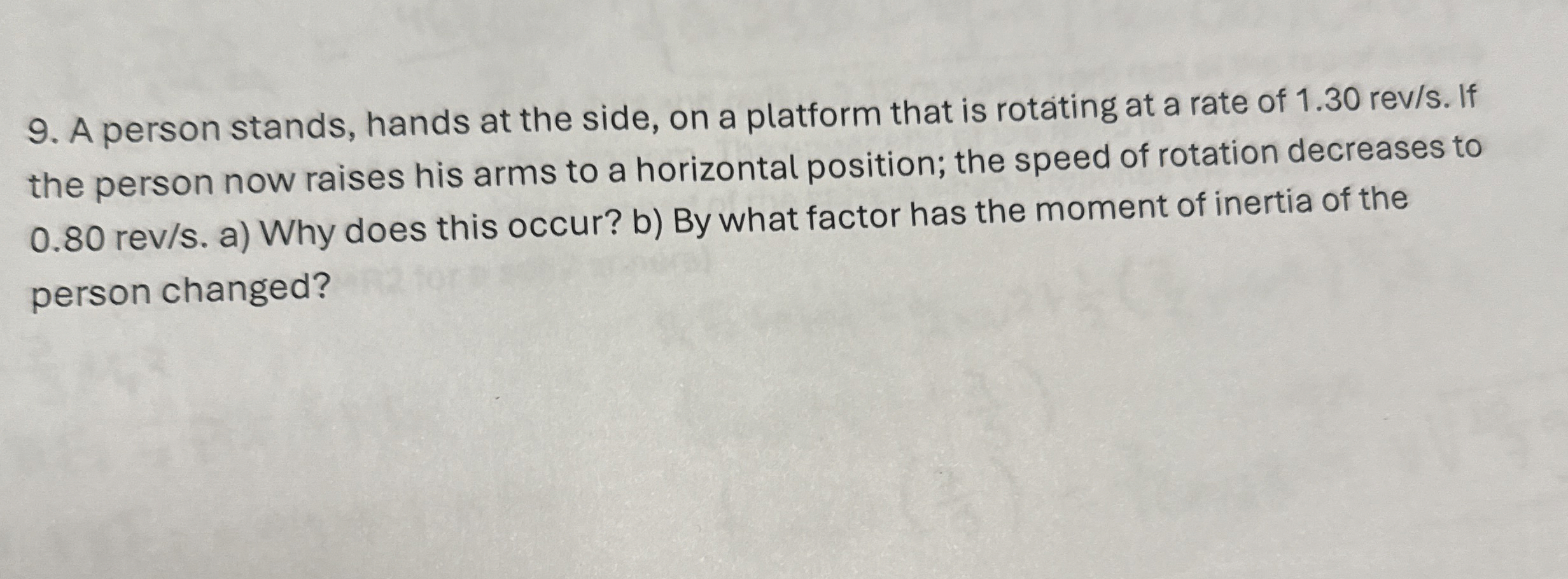 A person stands, hands at the side, on a platform