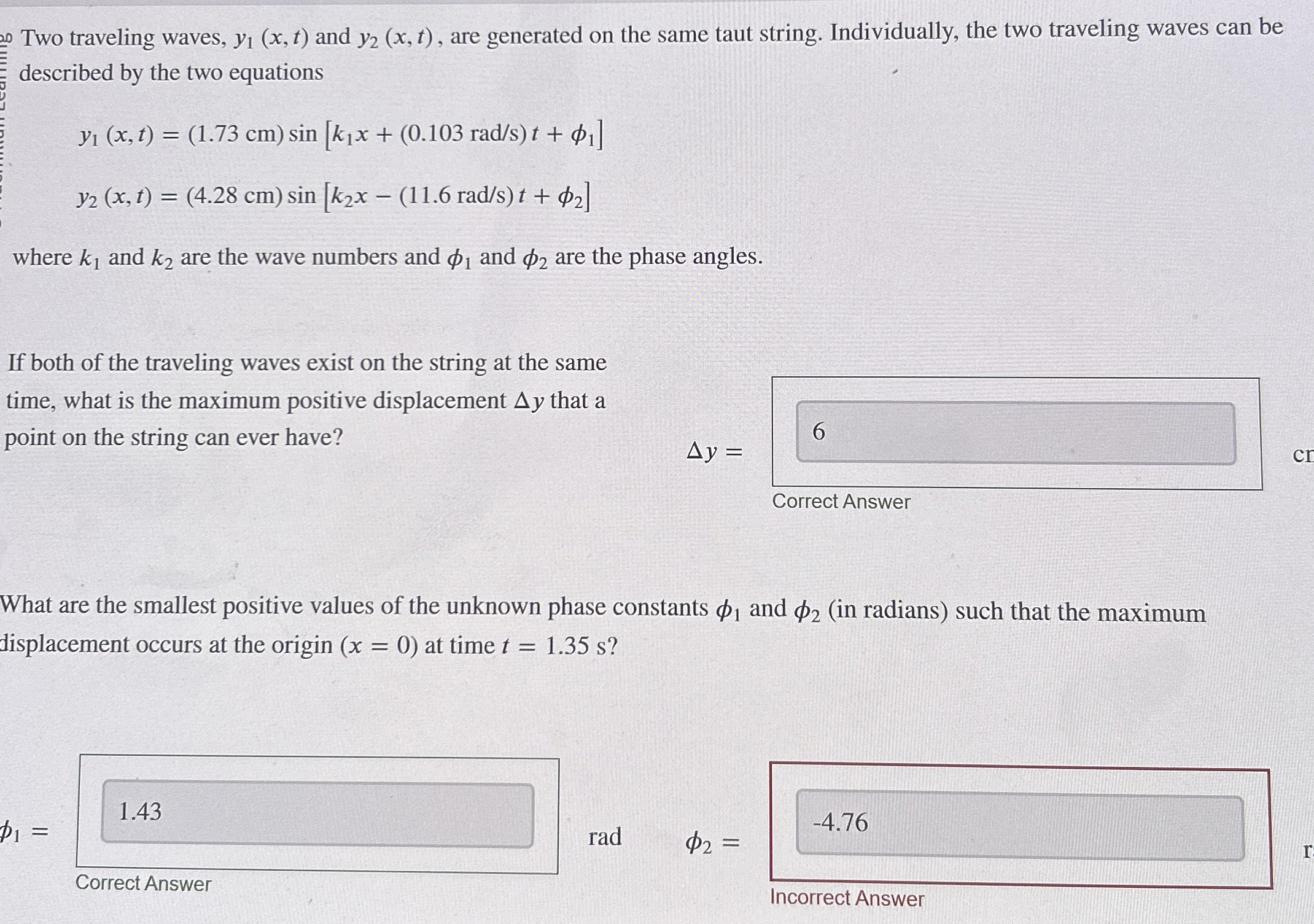 Two traveling waves, y 1 ( x , t ) and y 2 ( x ,