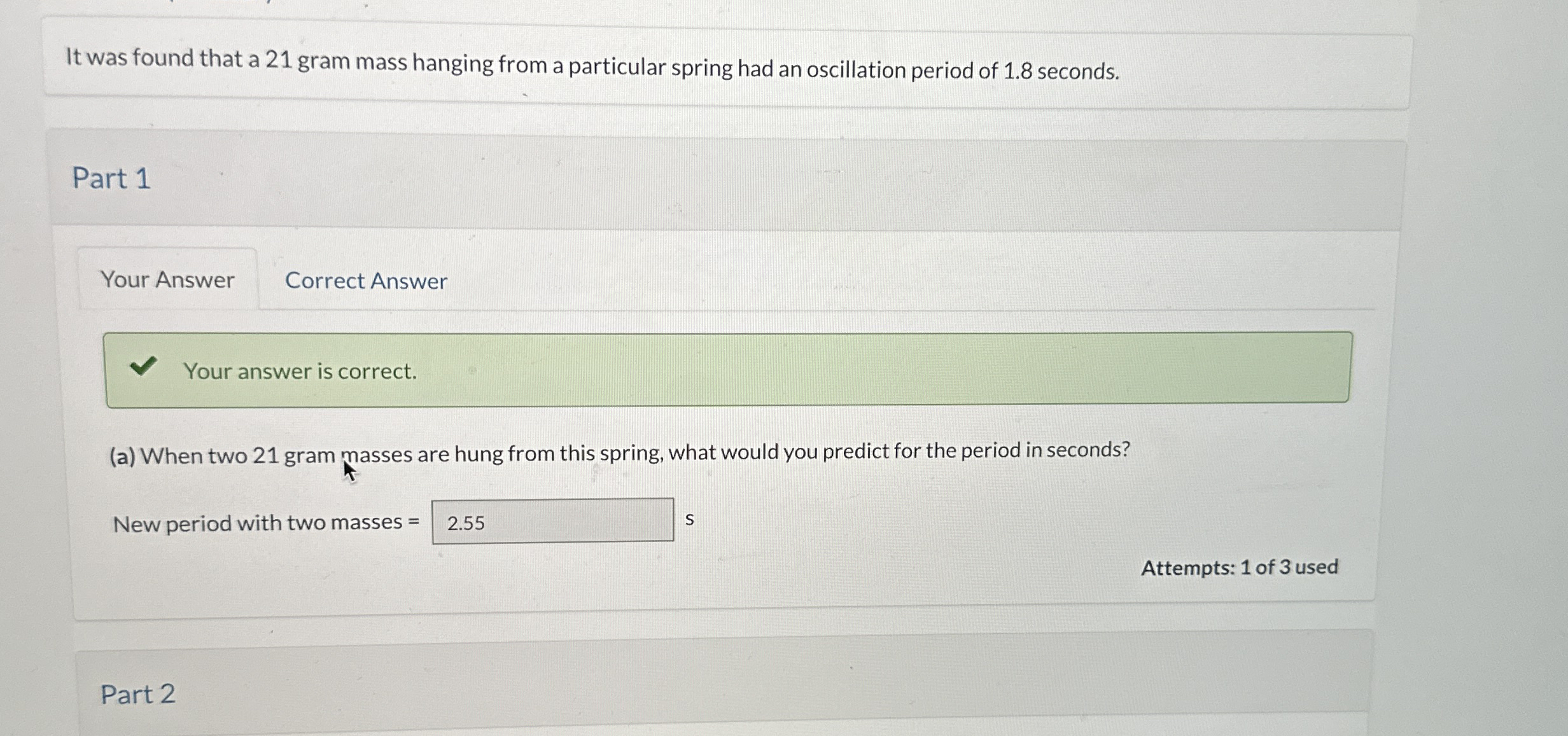 It was found that a 2 1 gram mass hanging from a