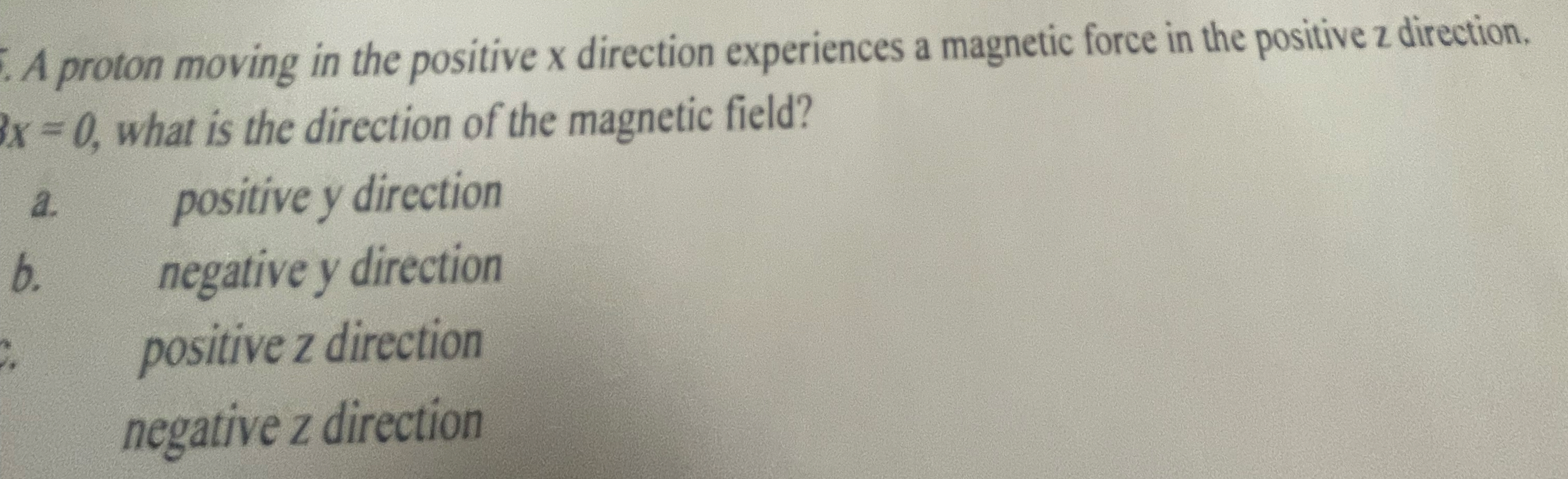A proton moving in the positive x direction