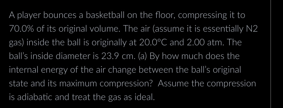 A player bounces a basketball on the floor,