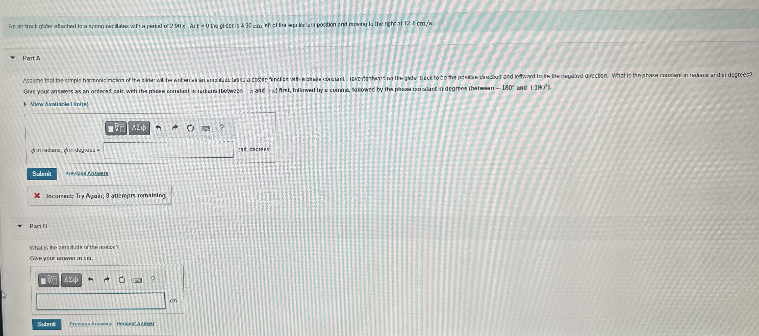 An air - track glider attached to a spring