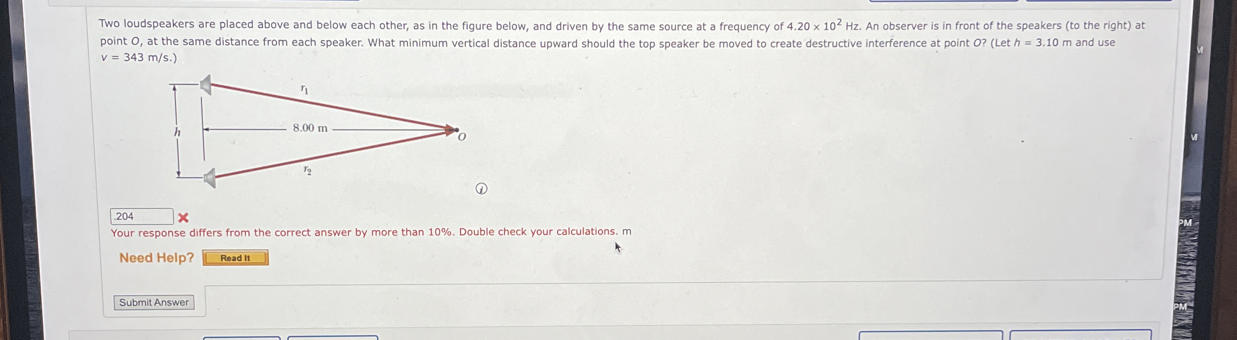 point O , at the same distance from each speaker.