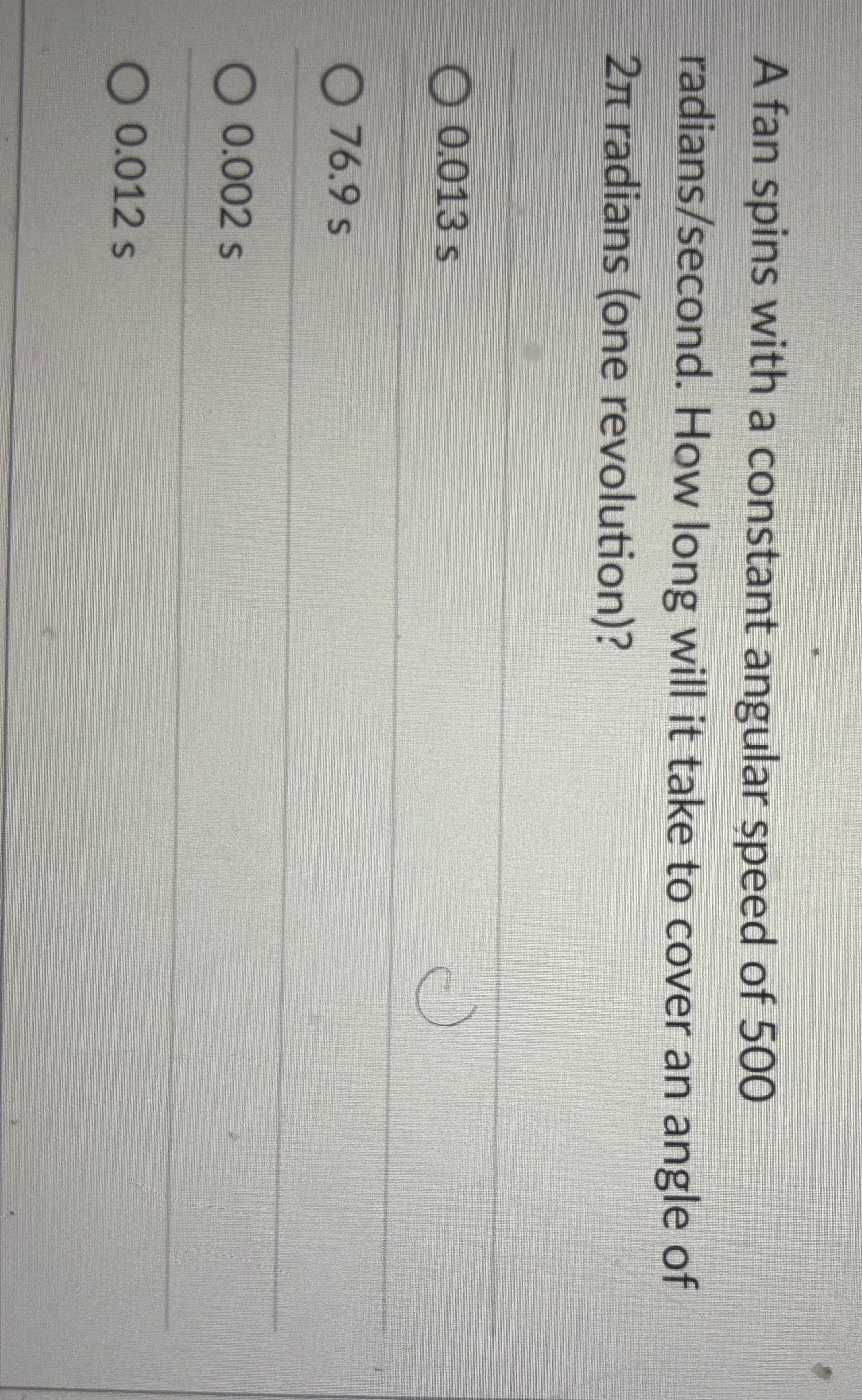 A fan spins with a constant angular speed of 5 0