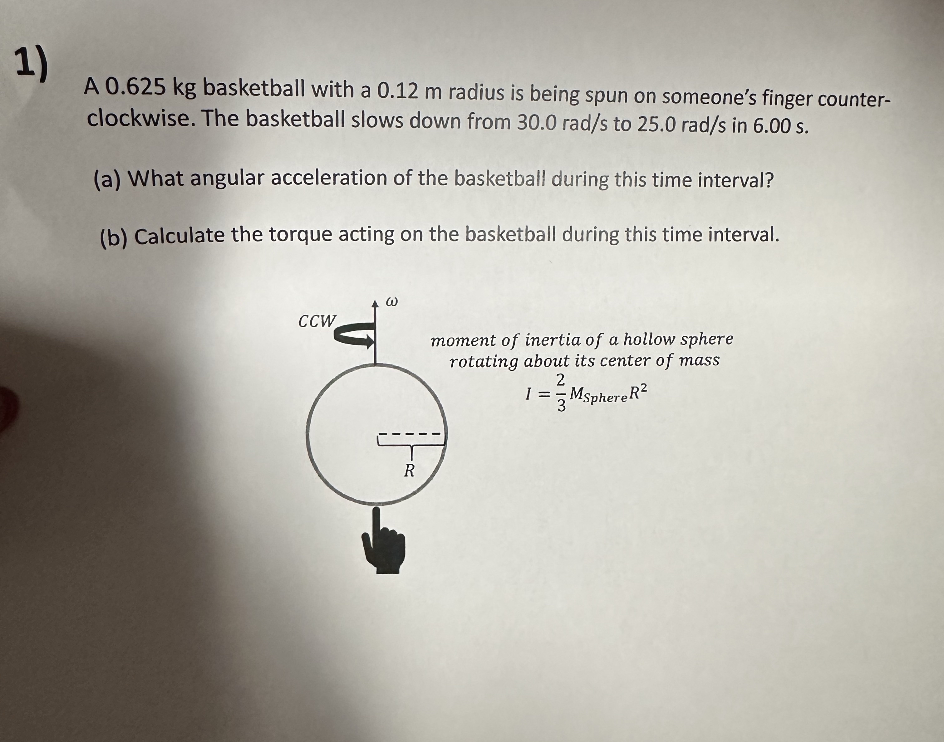 A 0 . 6 2 5 kg basketball with a 0 . 1 2 m radius