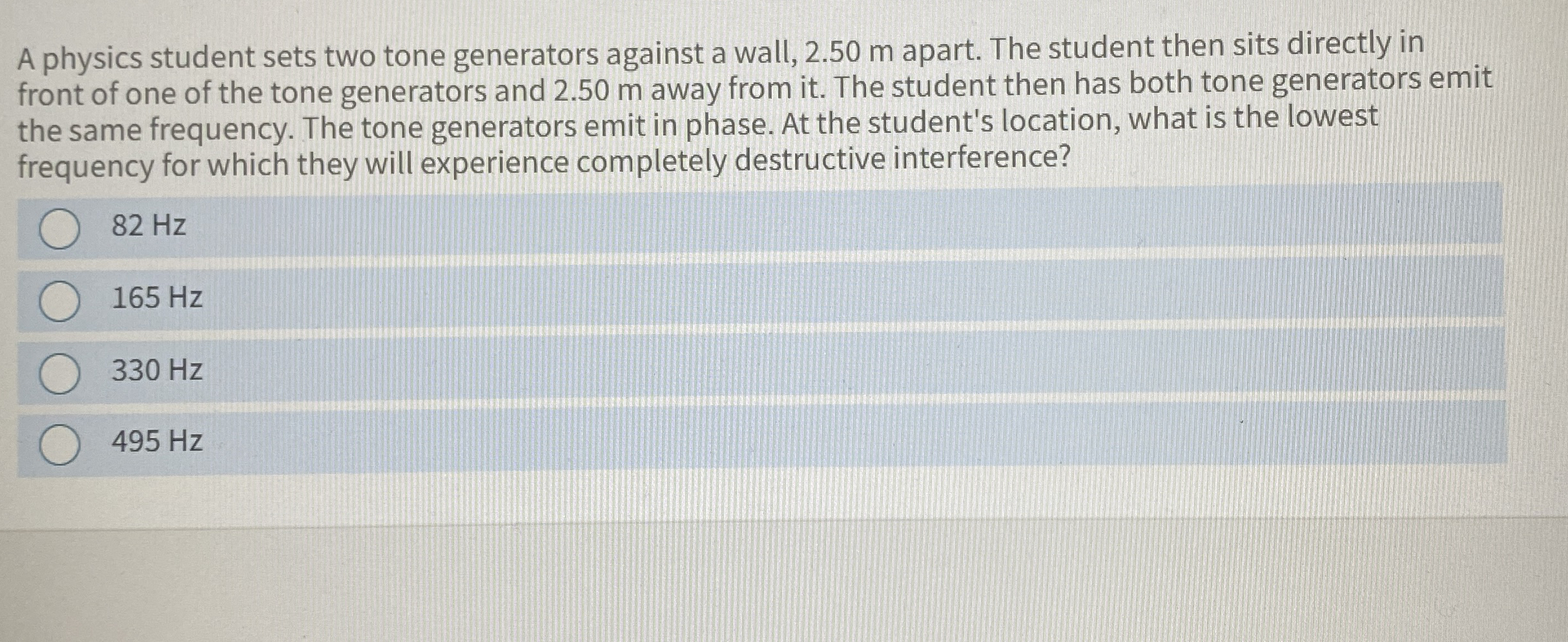 A physics student sets two tone generators