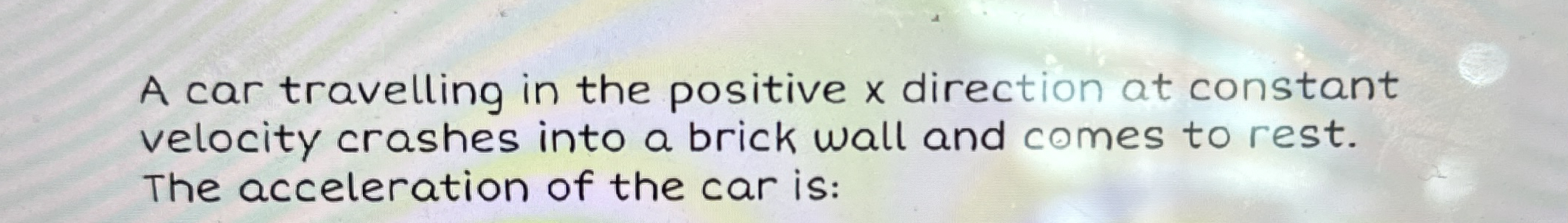 A car travelling in the positive x direction at