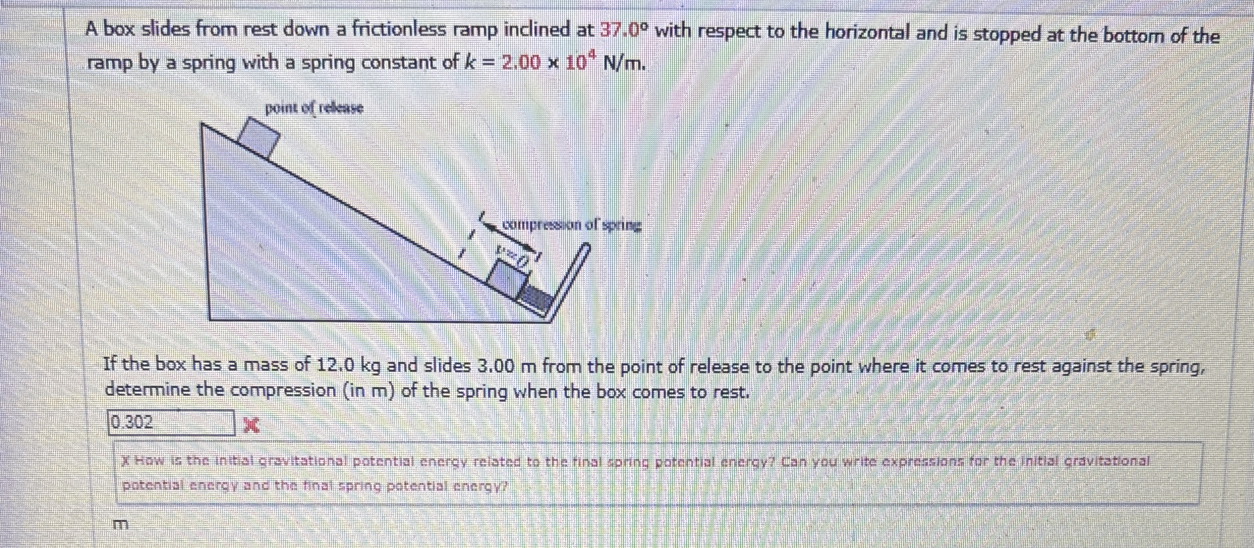 A box slides from rest down a frictionless ramp