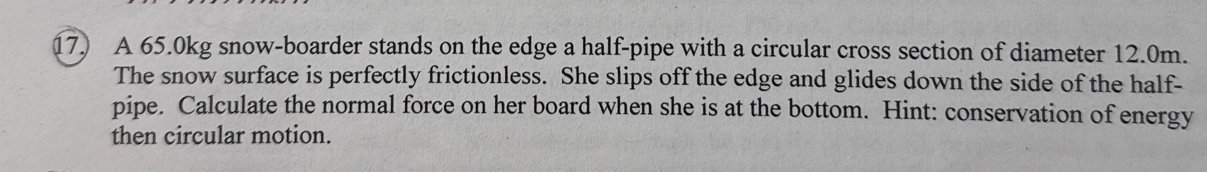 A 6 5 . 0 kg snow - boarder stands on the edge a