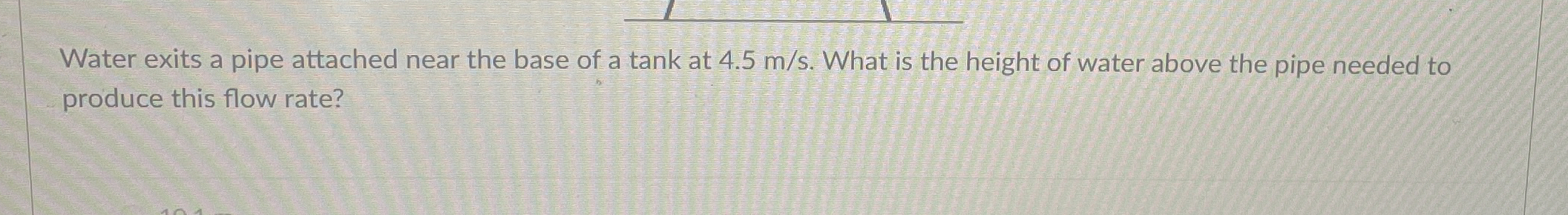 Water exits a pipe attached near the base of a