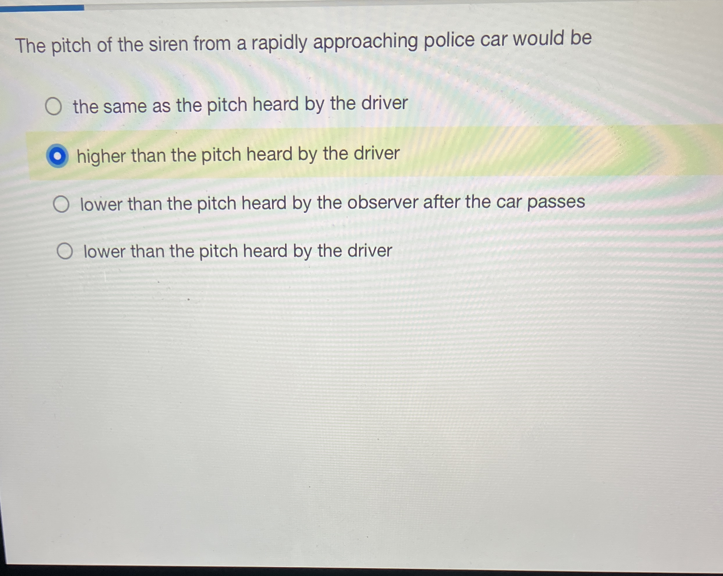 The pitch of the siren from a rapidly approaching