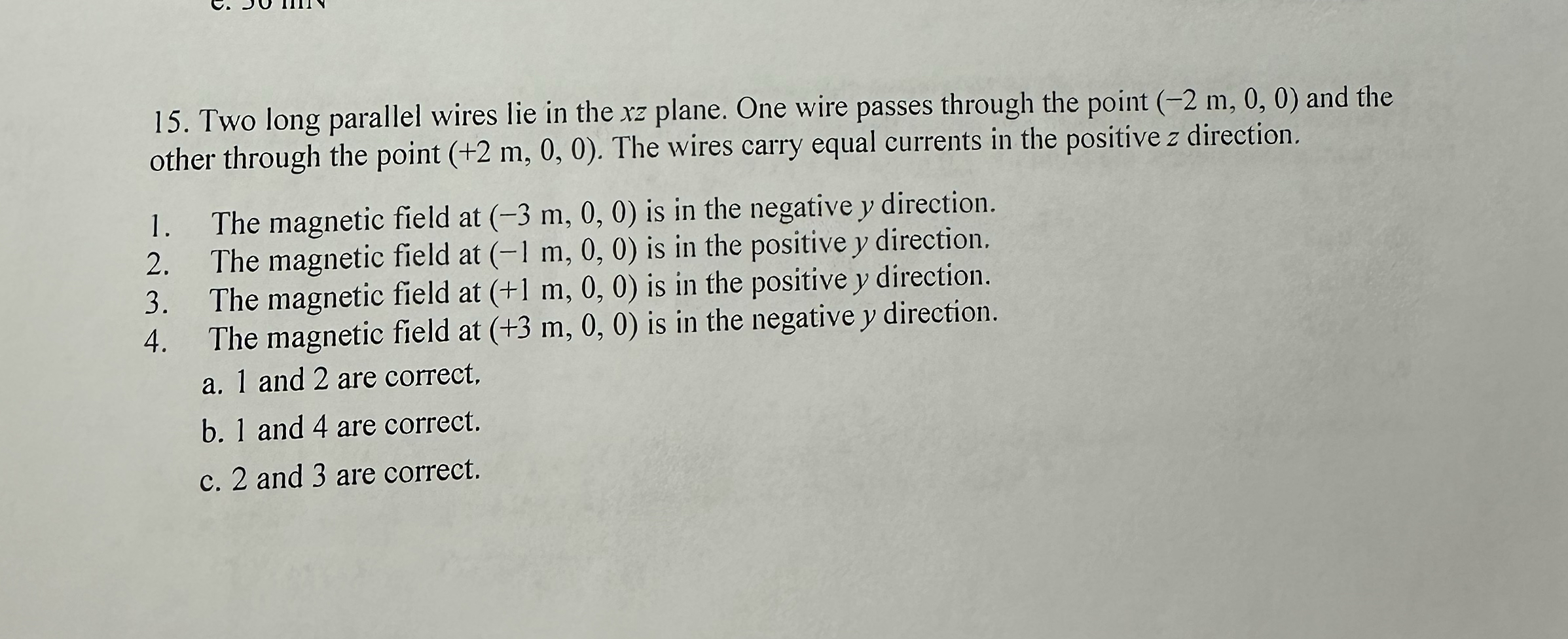 Two long parallel wires lie in the x z plane. One