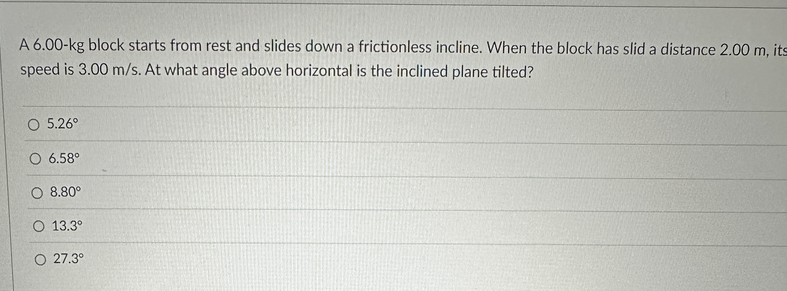 A 6 . 0 0 - kg block starts from rest and slides
