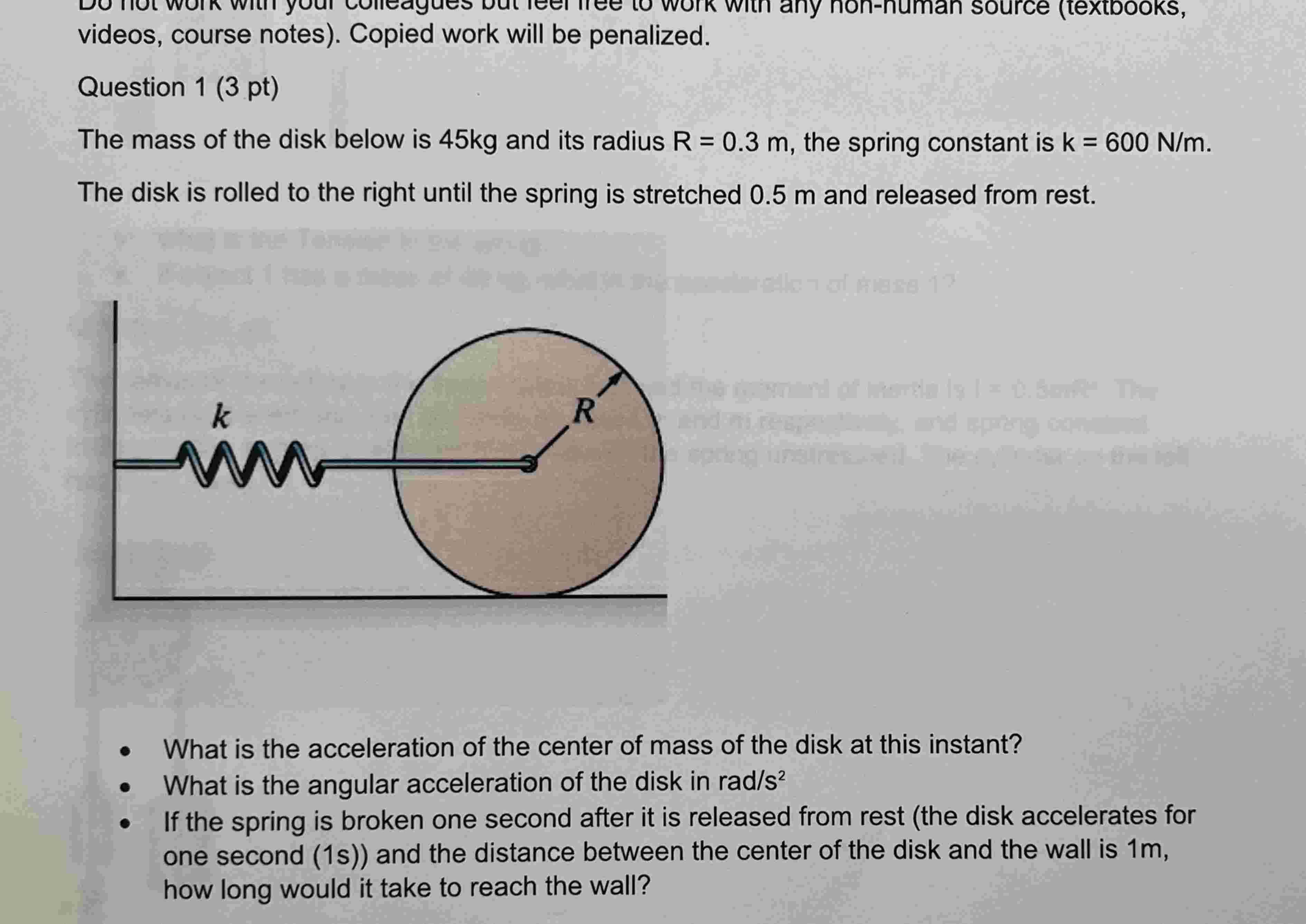 1 . What is the acceleration of the center of