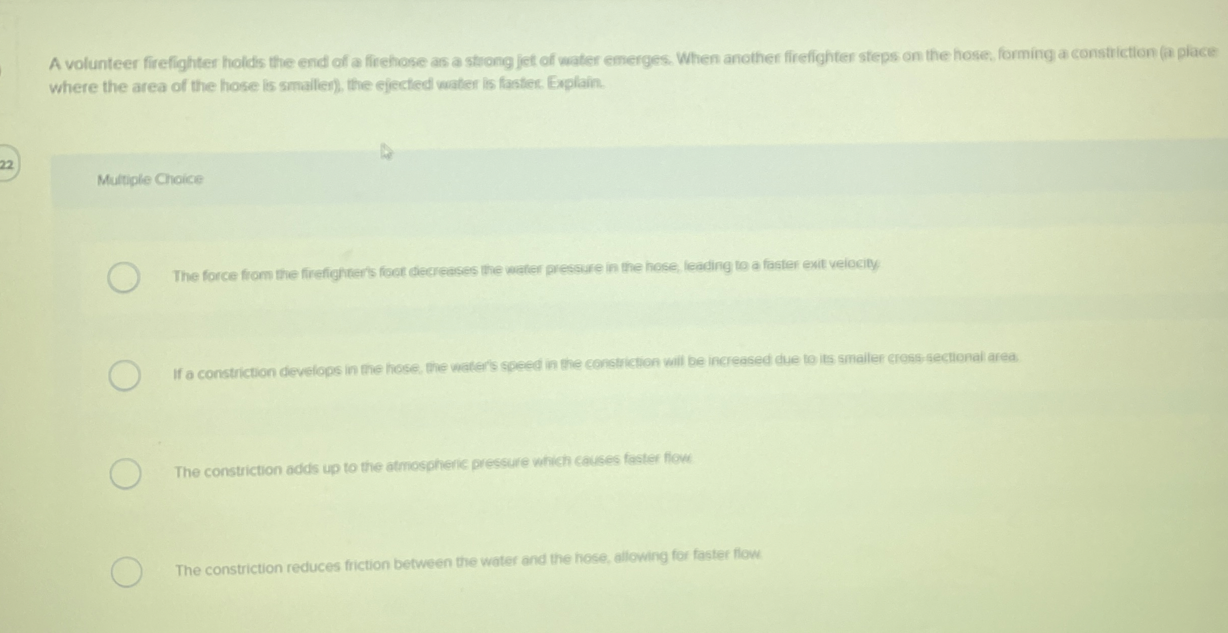 A volunteer firefighter holds the end of a