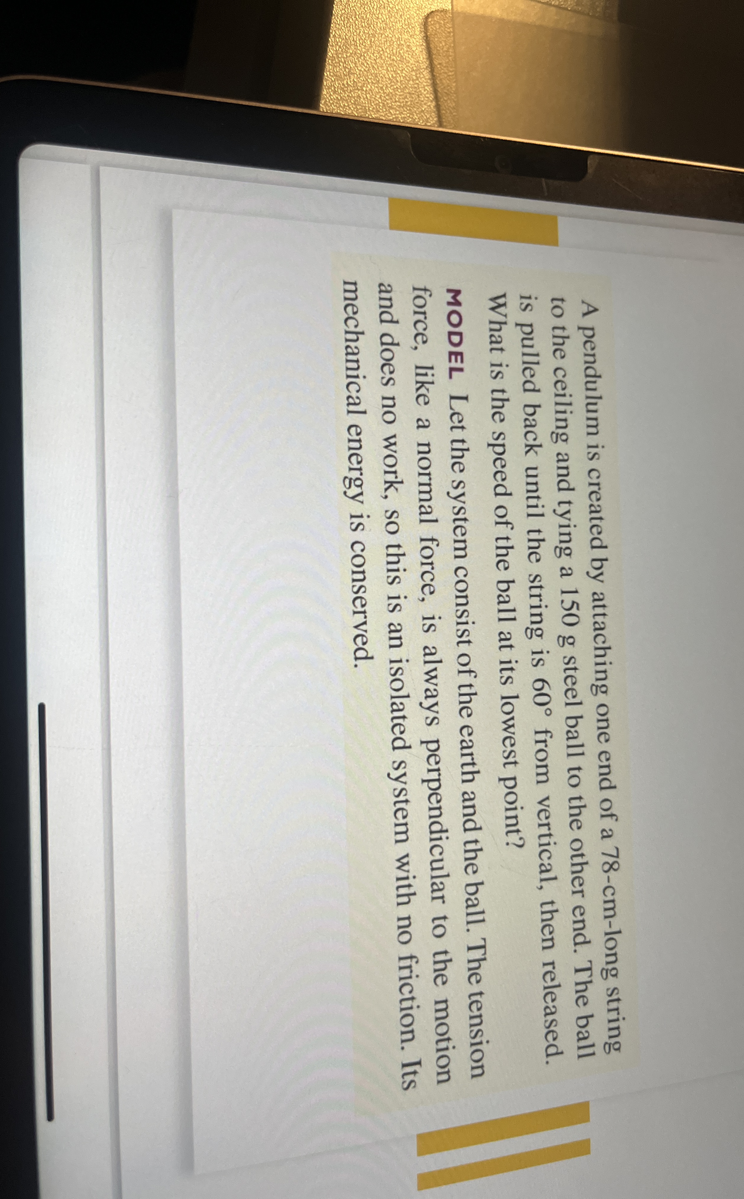 A pendulum is created by attaching one end of a 7