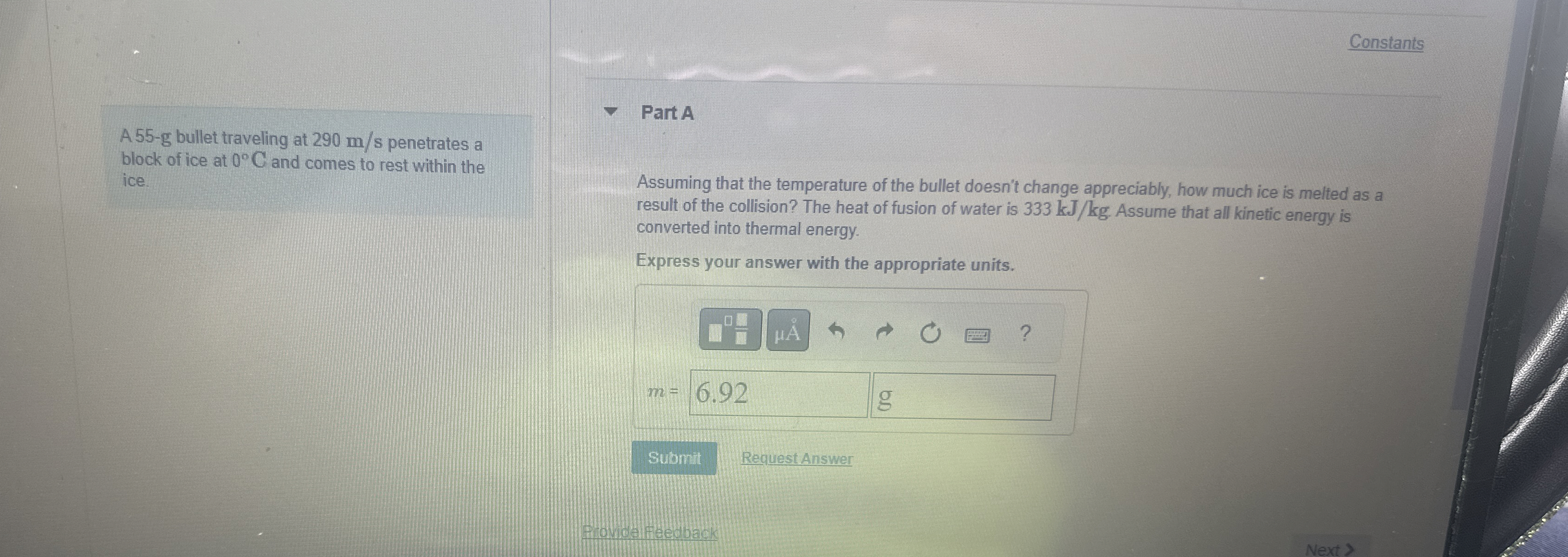 A 5 5 - g bullet traveling at 2 9 0 m s