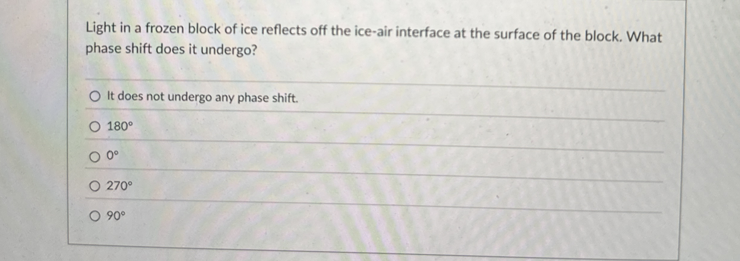 Light in a frozen block of ice reflects off the