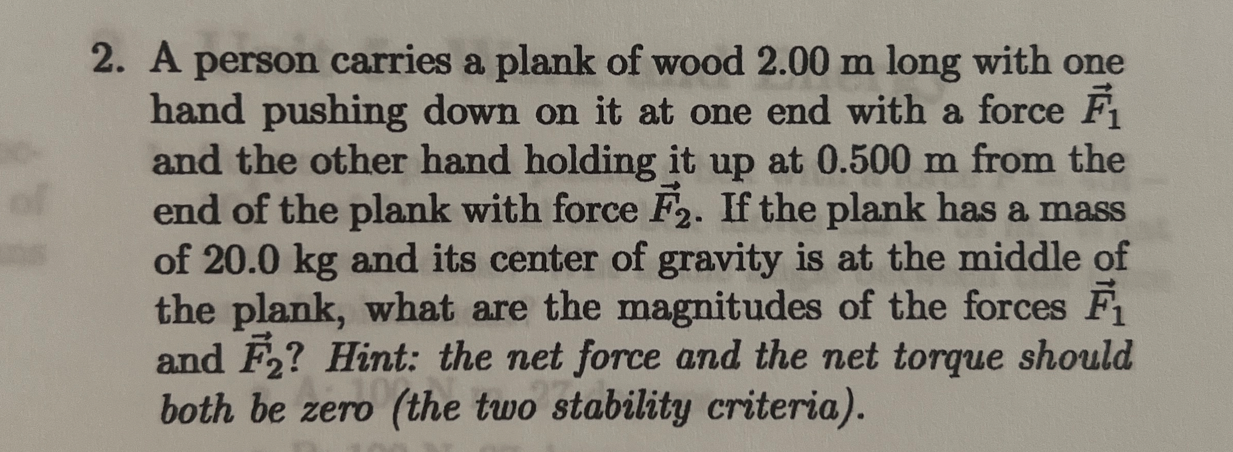 A person carries a plank of wood 2 . 0 0 m long
