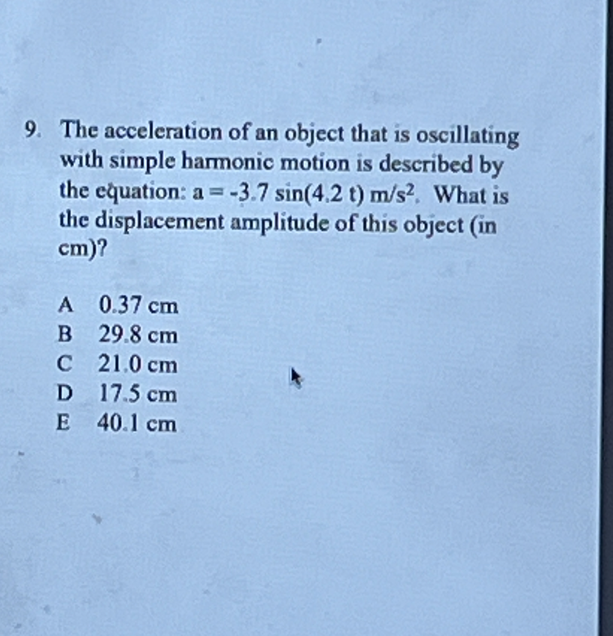 The acceleration of an object that is oscillating
