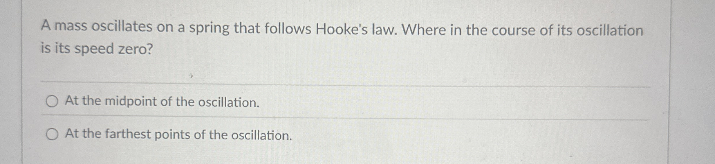 A mass oscillates on a spring that follows