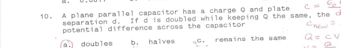 A plane parallel capacitor has a charge Q and