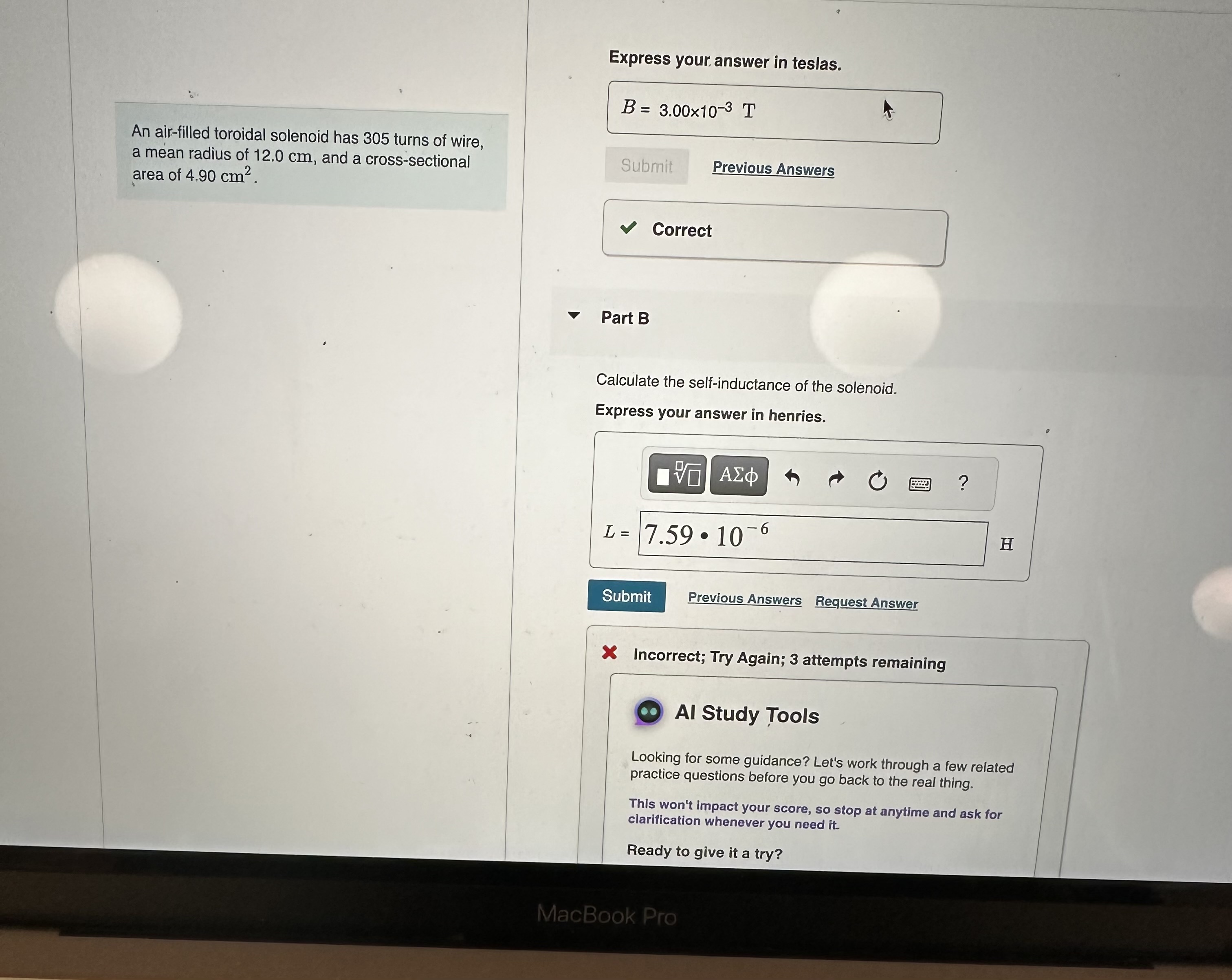 An air - filled toroidal solenoid has 3 0 5 turns