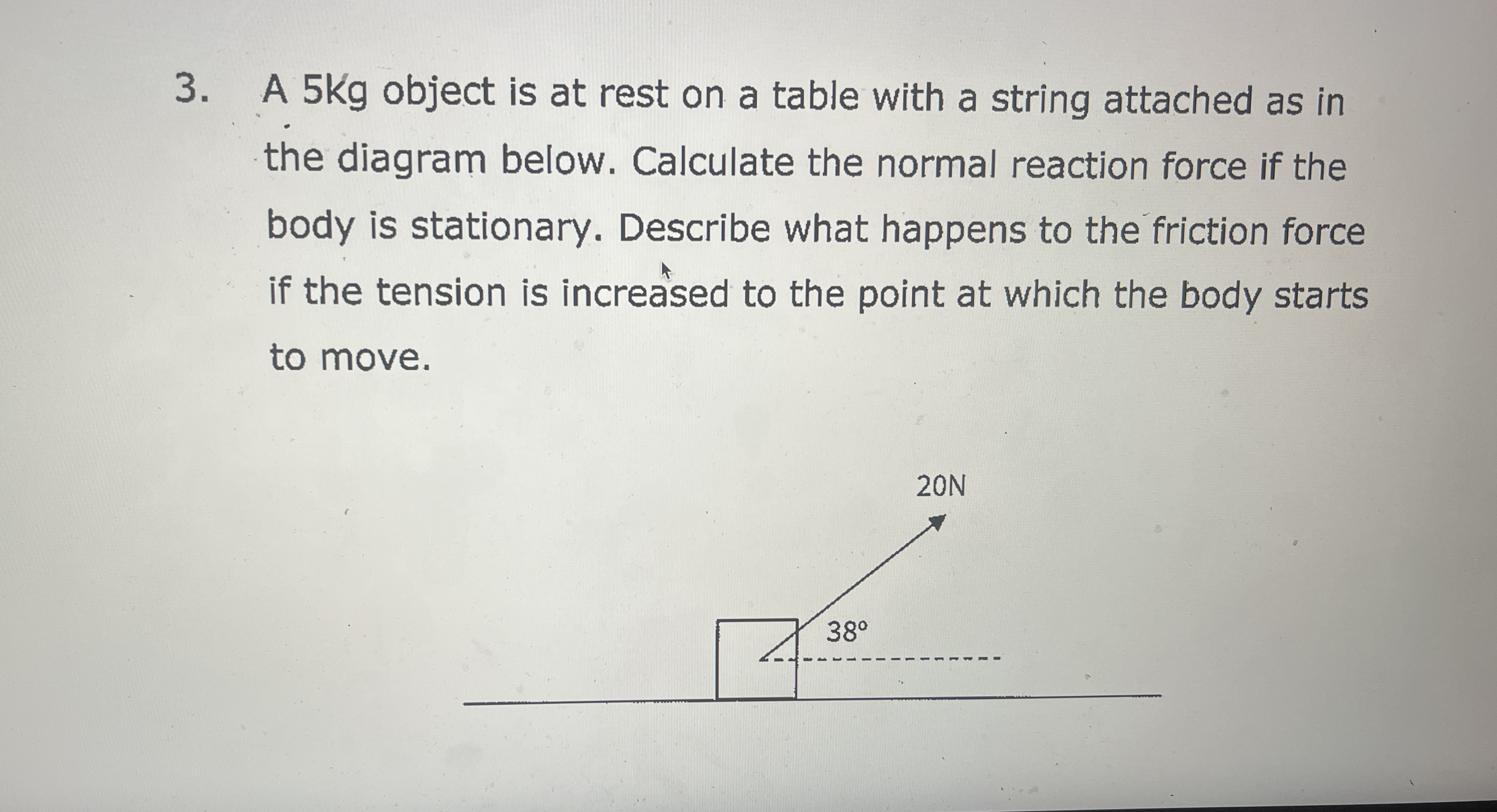 A 5 Kg object is at rest on a table with a string