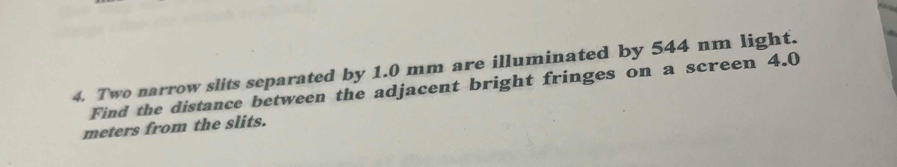 Two narrow slits separated by 1 . 0 mm are