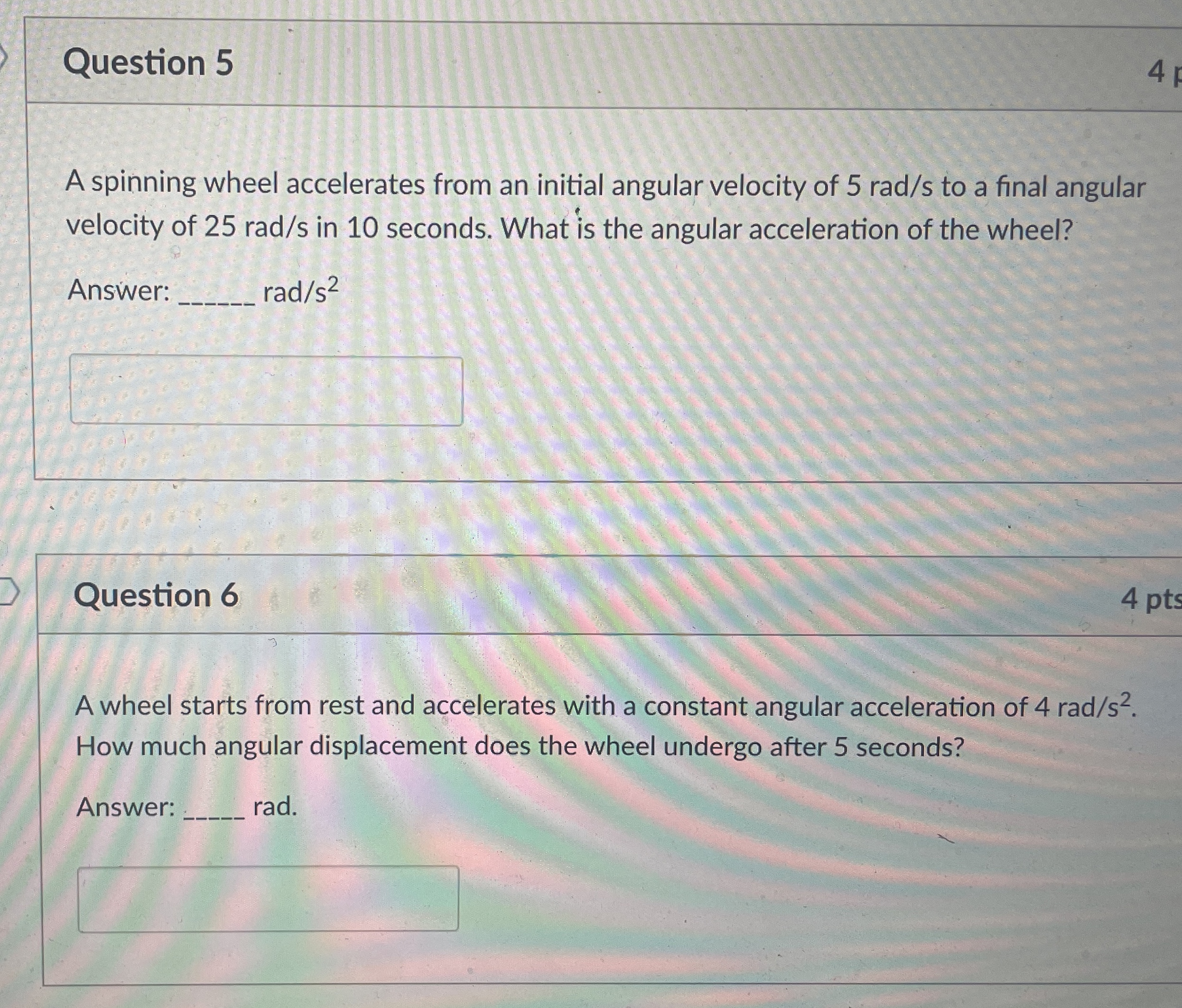 Question 5 4 A spinning wheel accelerates from an