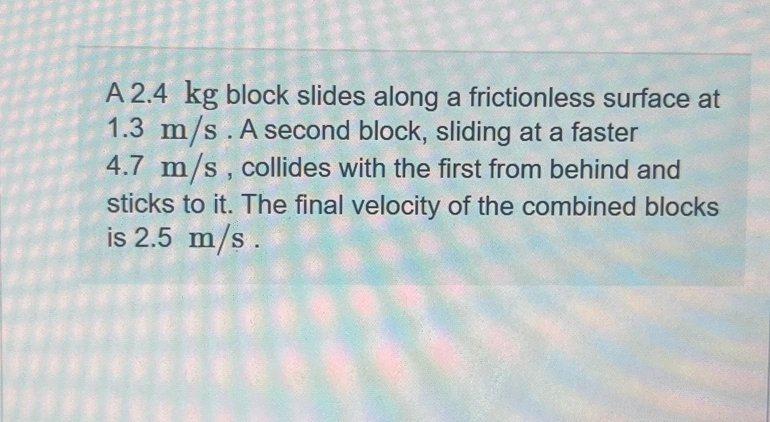 A 2 . 4 kg block slides along a frictionless
