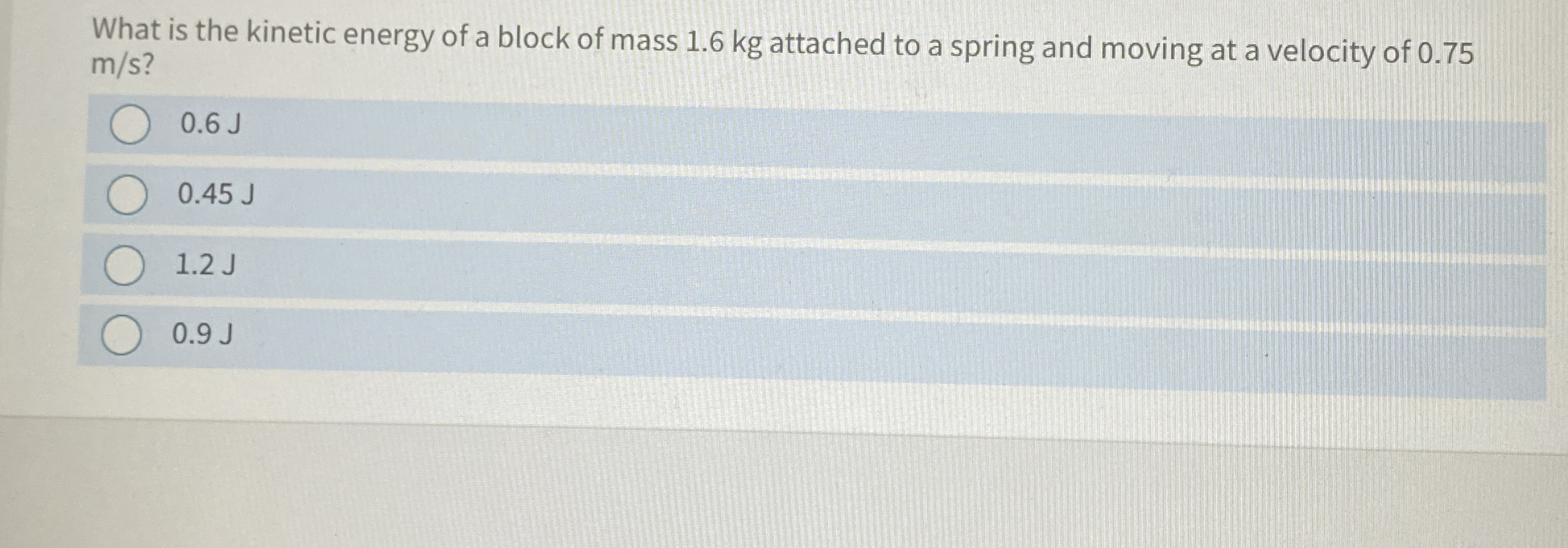 What is the kinetic energy of a block of mass 1 .